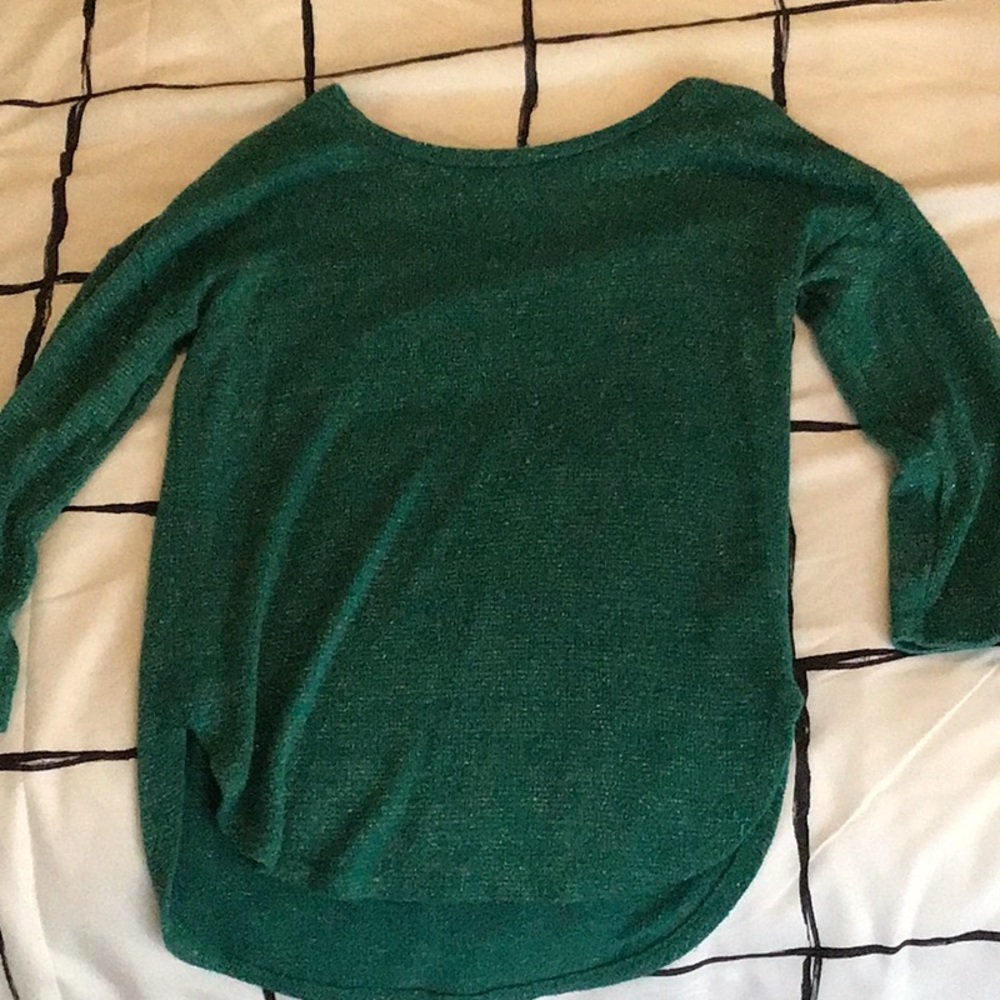Thin, green sweater.